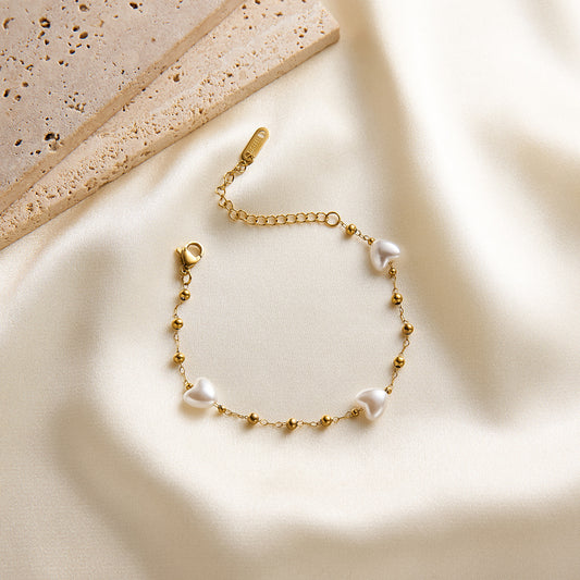 Pearl heart shaped gold bracelet