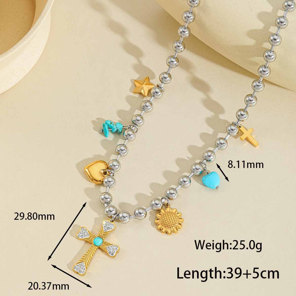 Mixed metal charm necklace