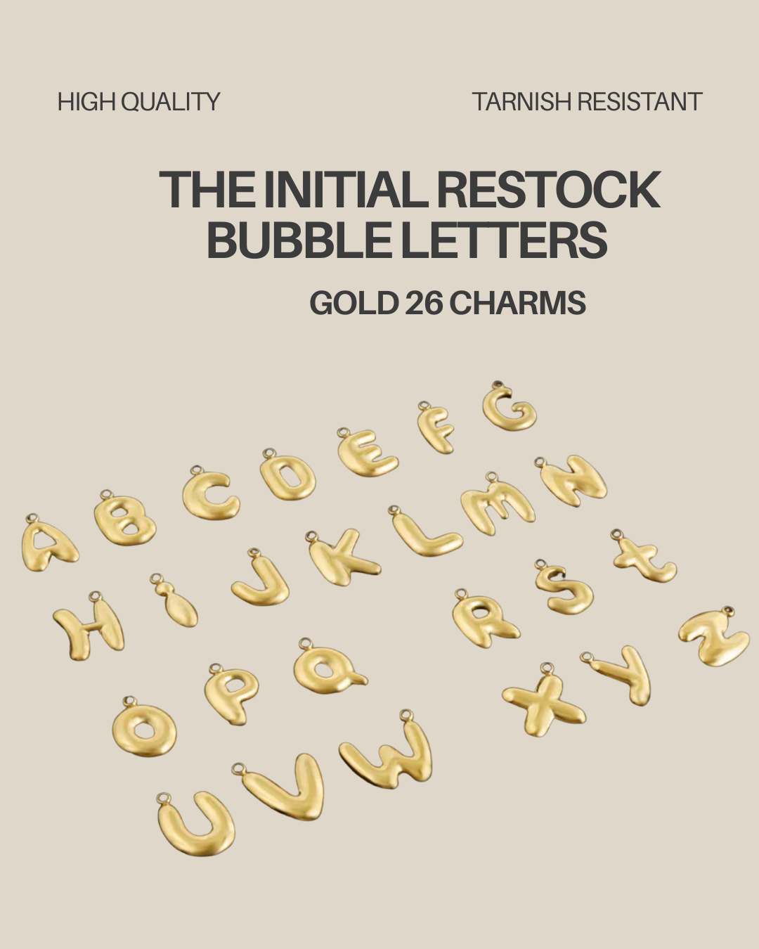 The initial restock bubble letters in gold and silver