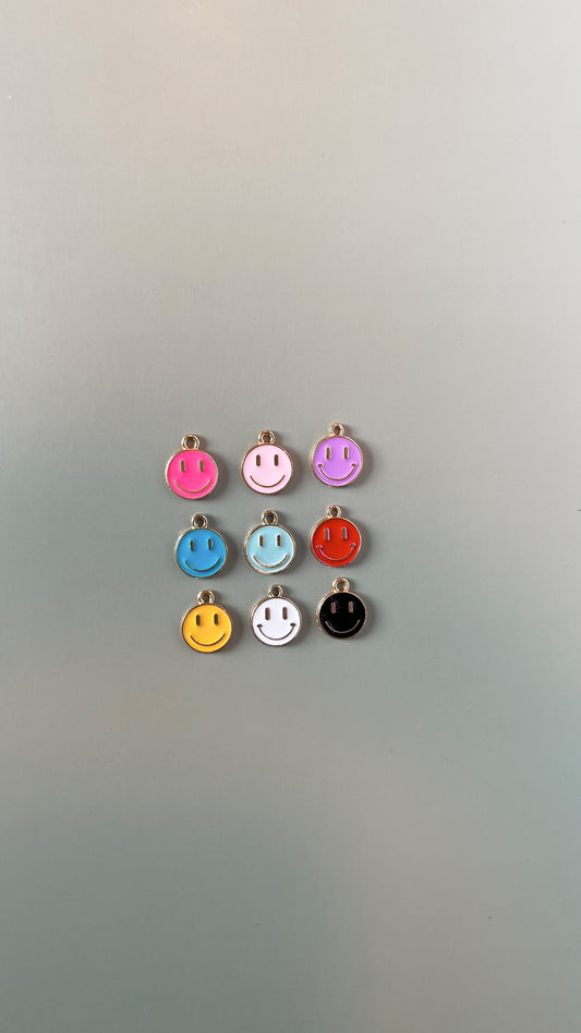 Assorted colored smiley face charms