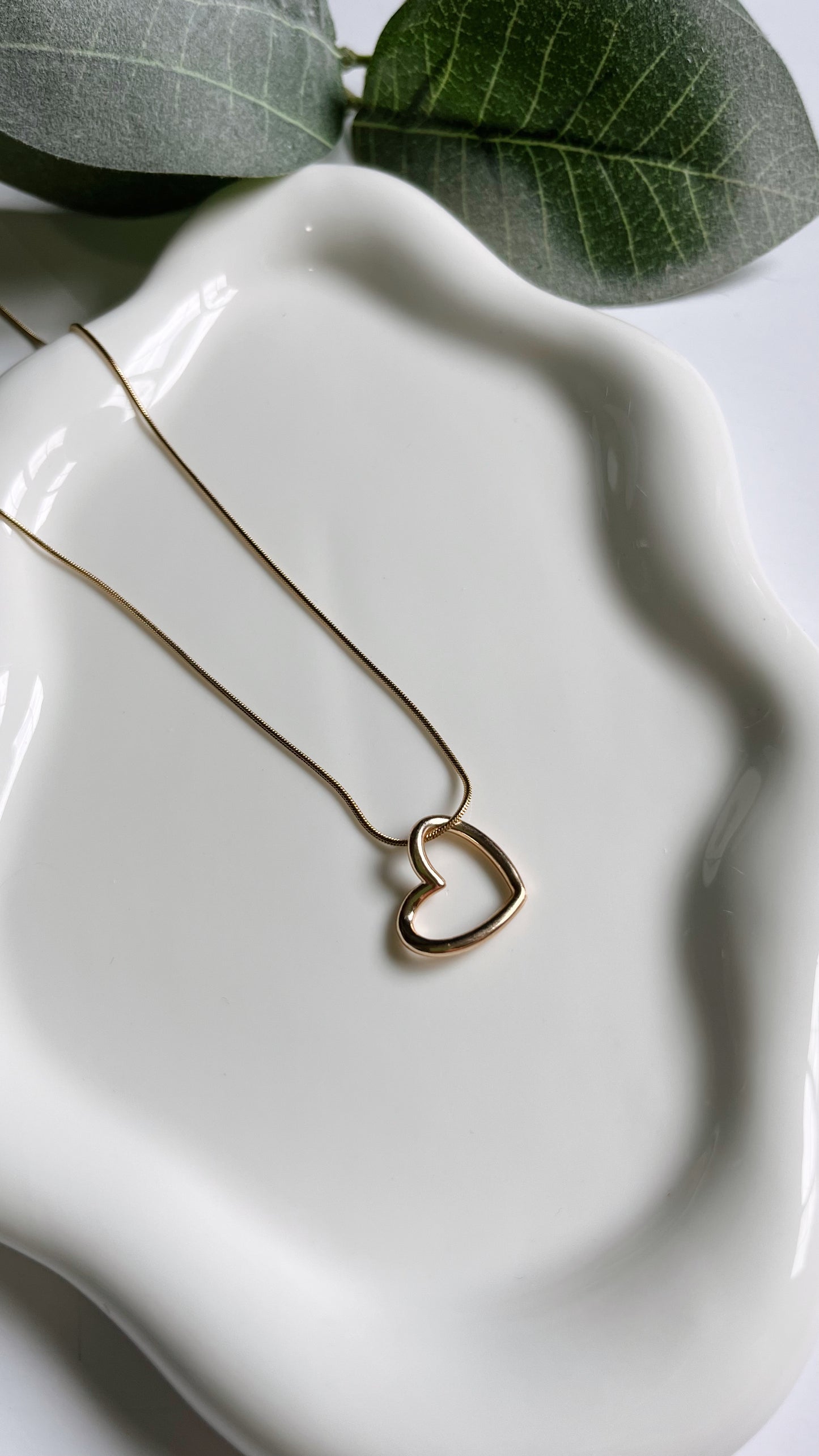 Silver and gold heart necklace