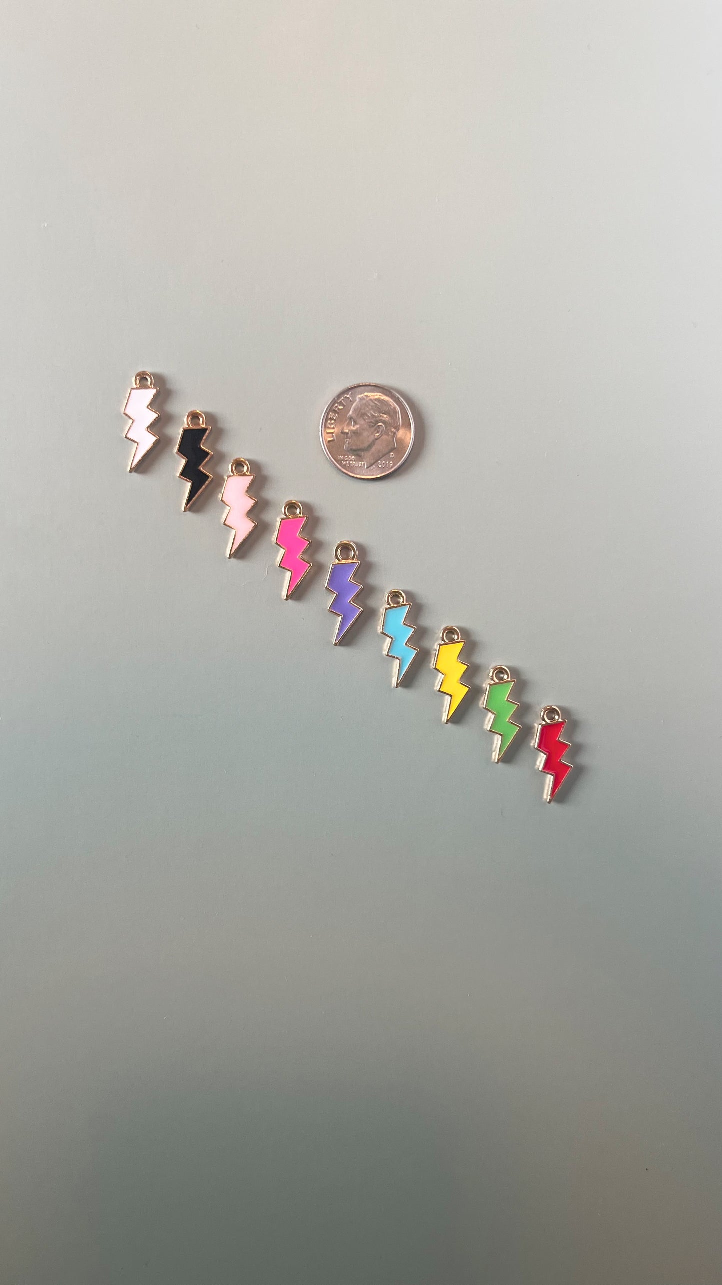 Colored lightning bolt charms